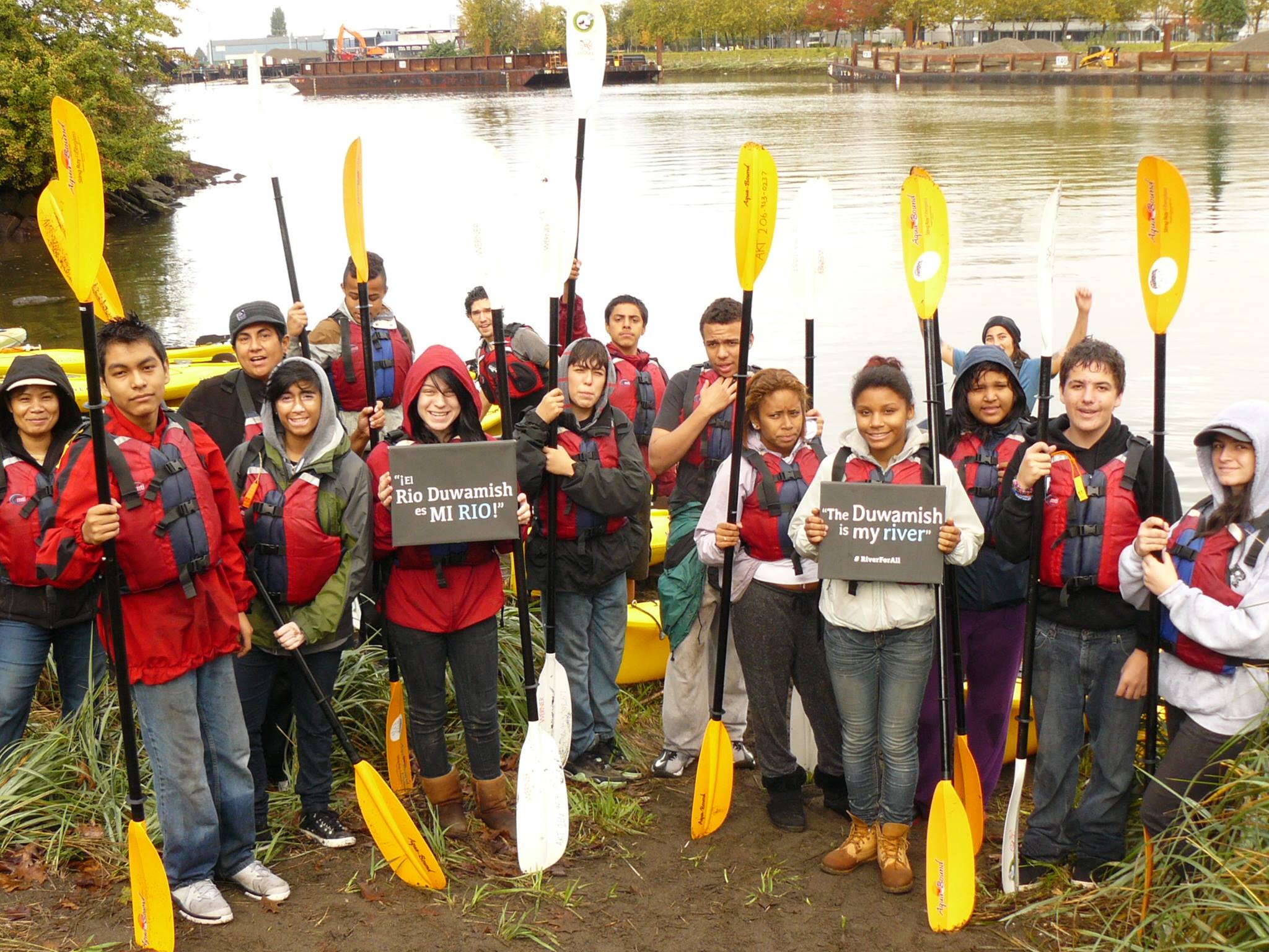 Youth in front of Duwamish River