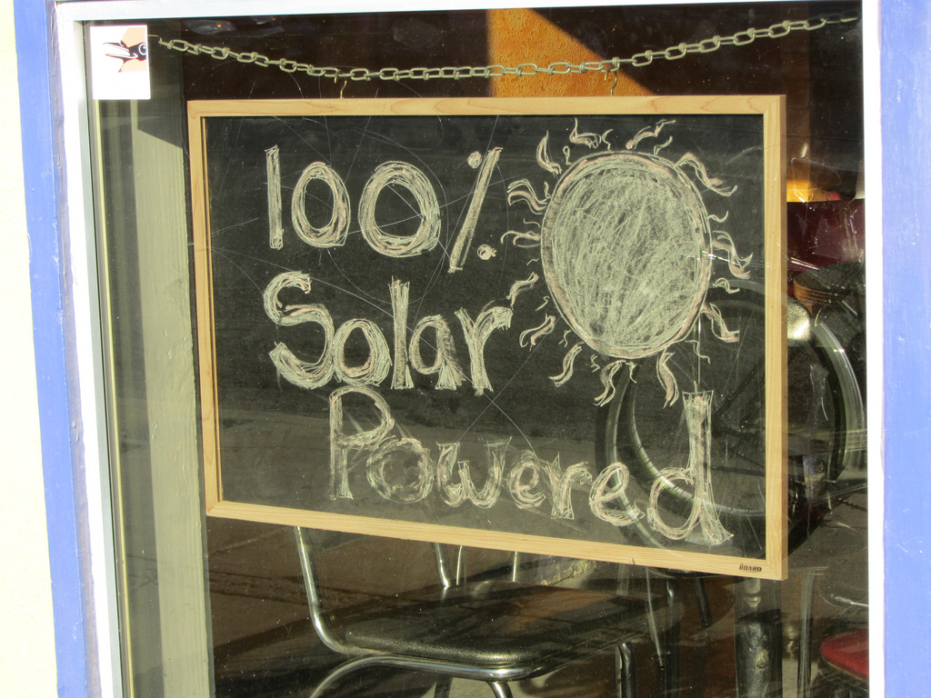 100% solar sign
