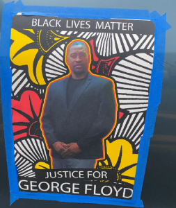 Photo of poster which says Black Lives Matter and Justice for George Floyd